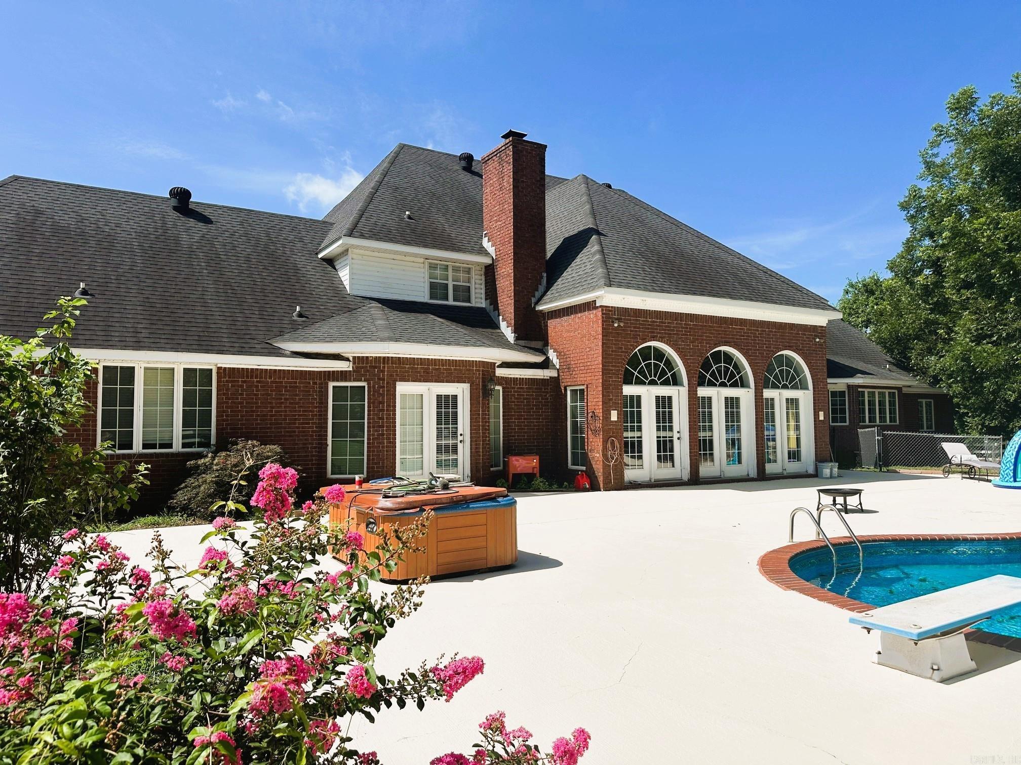 A rare estate find boasting over 5,000 square feet of a CUSTOM built estate home!!! On 2.55 acres!! Marble showers, wet bar, granite countertops, office and an EXCEPTIONAL MASTER SUITE AND BATHROOM!! Beautiful setting on a hillside with views and just minutes from the interstate, schools and shopping!!! IN ADDITION, this property includes 2 guest houses with individual garages adding an additional 1,500 square feet!! This property has so much to offer!! Call us today!!