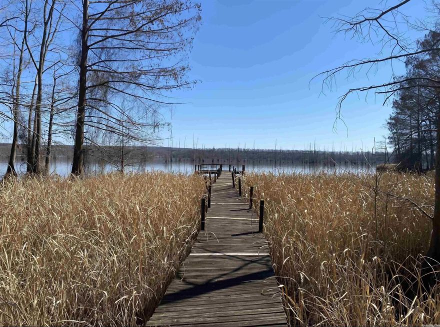 This lot is ready for you to park your R/V with full hookups or build a cozy cabin and enjoy lake views and peaceful surroundings.