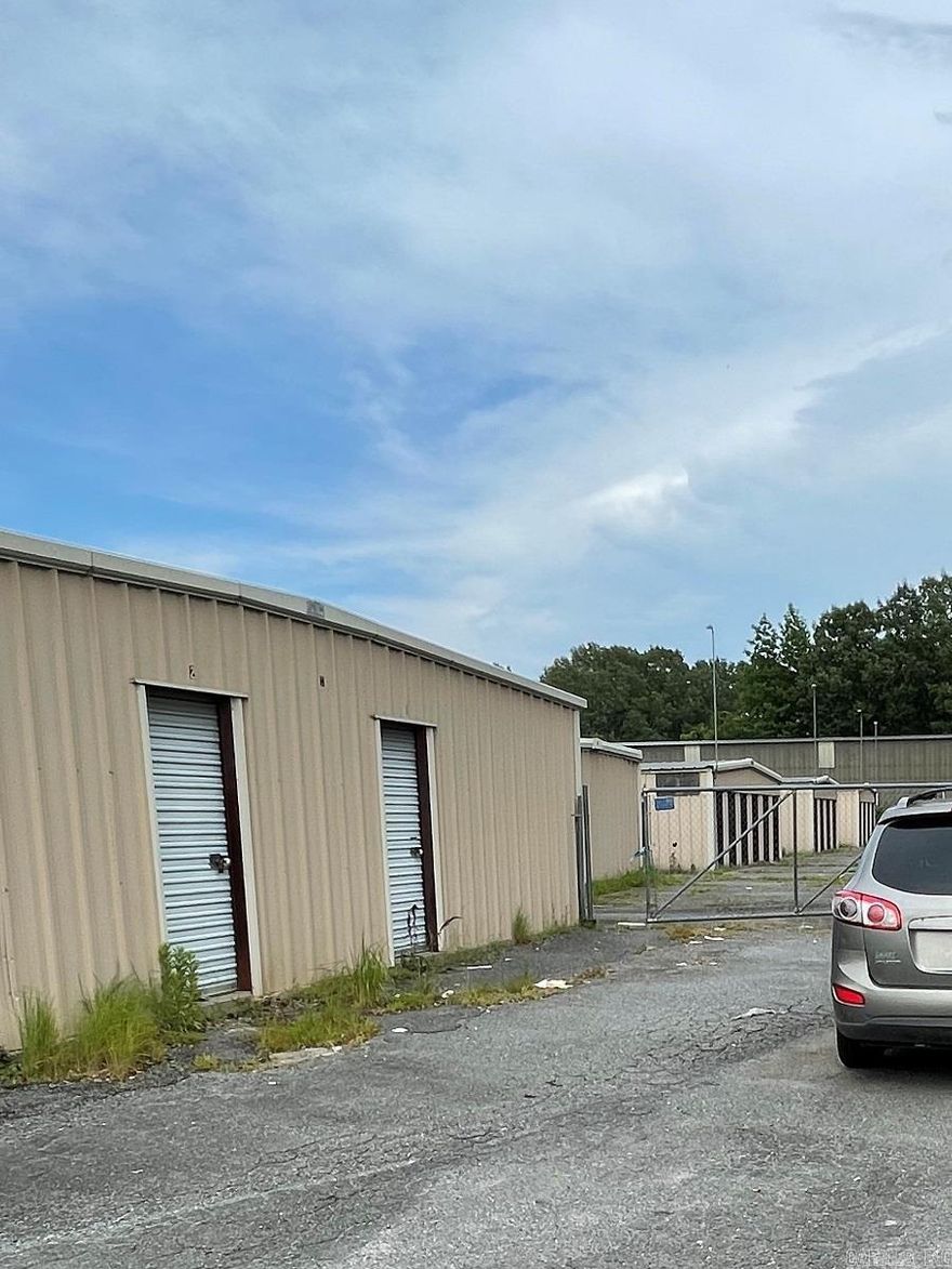 Mini Storage Buildings on 1.06 acres, property is fenced and gated.