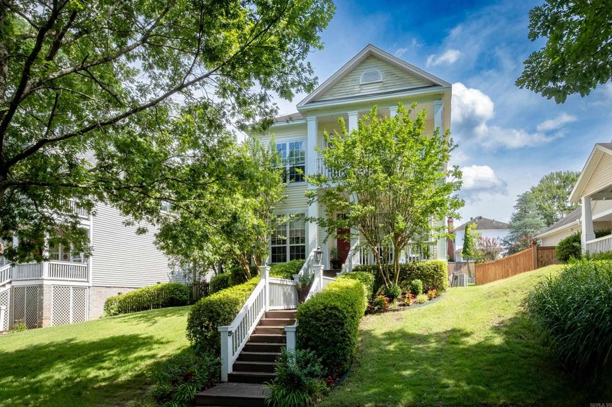 This home exudes charm and character, nestled in the picturesque WLR Brodie Creek Community. A welcoming front porch leads into the main level, featuring a living room w/ hardwoods & a wood-burning/gas fireplace, a formal dining room and a kitchen/breakfast area w/ a convenient 1/2 bath and a generously sized laundry room w/ ample storage & sink. The primary bedroom boasts newer Luxury vinyl plank flooring, a view of the backyard, a spacious bathroom w/ double vanities, walk-in shower, jetted tub, & a sizable walk-in closet. Upstairs, 3 spacious bedrooms provide plenty of room for family or guests, accompanied by a hall bathroom & a versatile bonus room -  perfect for use as a storage room or a hobby room/playroom, catering to your unique needs. The exterior of this home lives much like a patio home, with a fantastic covered porch overlooking a lush, landscaped yard and a generous patio - ideal for outdoor entertaining or simply relaxing and enjoying the serene surroundings. Alley access provides entry into the 2 car rear loading garage. New HWH. This home truly blends charm, character, and functionality, offering a delightful living experience in the heart of Brodie Creek.