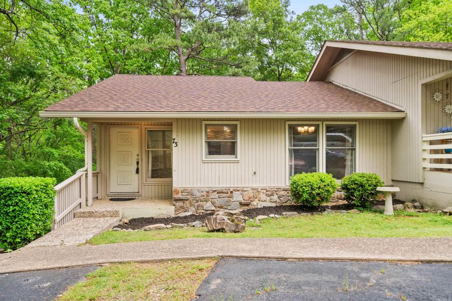 Spacious & Updated Corner Unit with Scenic Creek Views! This beautifully maintained corner unit offers a blend of comfort and charm, featuring 3 bedrooms, 2 baths, and multiple living spaces across two levels. The main level boasts a cozy living room with a decorative fireplace, a bright sunroom/office. and an updated kitchen lined with modern tile and stainless appliances. The master suite includes access to a completely renovated bath and exterior entry. Downstairs, you'll find two additional bedrooms, another completely updated bath, a laundry/storage room (approx. 26’ x 5’) with cabinetry and built-ins, and a sunporch with exterior access. Enjoy the outdoors from your upper-level deck (approx. 7’8” x 12’6”), overlooking a peaceful, tree-lined green space and flowing creek. Freshly cleaned carpets, luxury vinyl plank flooring, and stylish finishes throughout. Covered front porch and abundant natural light make this home a must-see! (Agents see remarks)