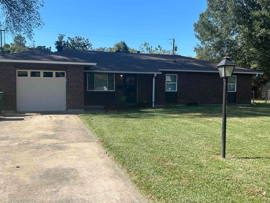 Welcome to this well-kept 3 bedroom, 1.5 bath brick home, perfectly situated on a spacious and beautifully maintained lot. This property offers plenty of charm, and a fenced-in backyard with a covered patio-perfect for entertaining. This home also features an attached garage. This home is SOLD AS-IS but is full of possibilities! Schedule your showing today!