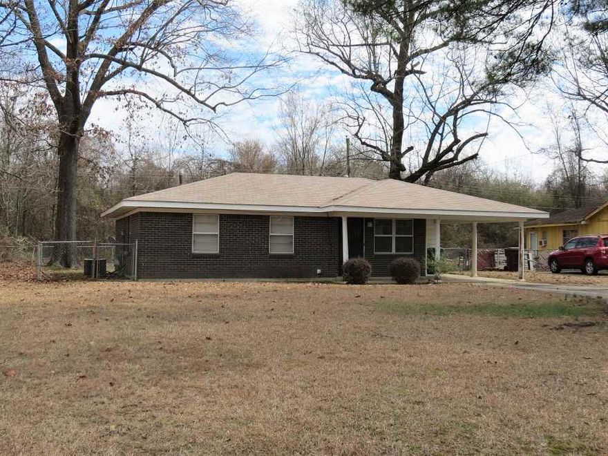 Perfect home for first time buyers!!  It is move in ready!!  This brick home has 3 bedrooms and 1 bath, 1 carport, fenced backyard.  It has gas stove, microwave, new refrigerator, washer and dryer!!  Laminate flooring looks brand new.  Double pane windows, storms doors, newer blinds, roof approx. 4 years old, ch/a approximately 10 years old, HMA home warranty for the new buyer!!  Call today for your personal tour!