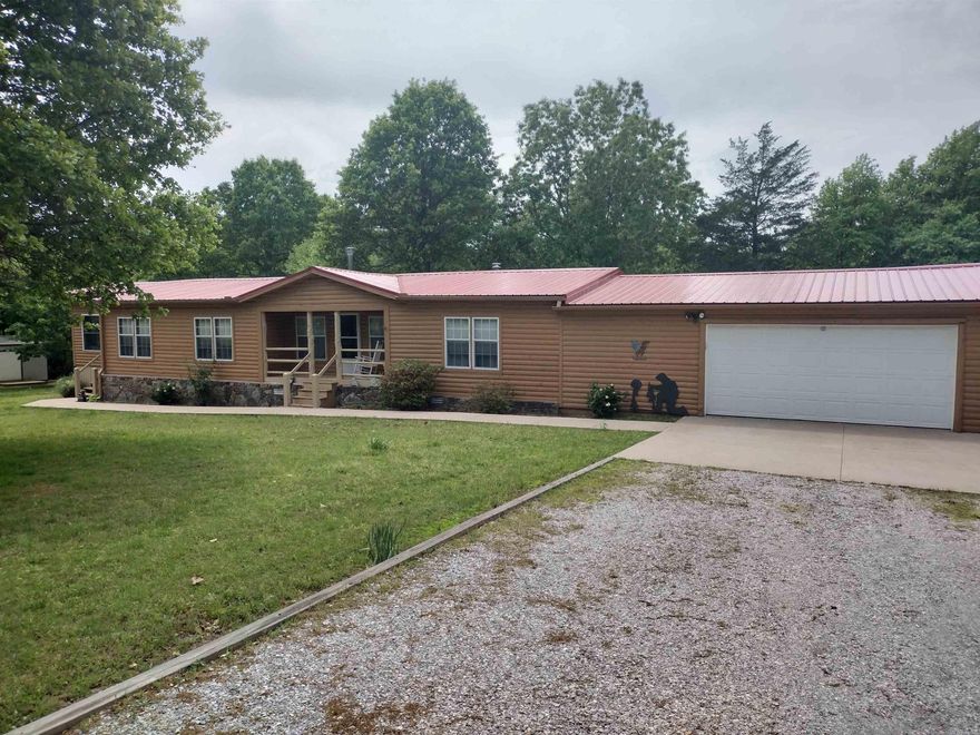 Situated on 1.55 acres m/l this beautiful 3-bedroom 2-bathroom home features a storage shed, studio, whole house generator, and storm shelter. The property boasts a spacious sunroom to enjoy the scenic views, a lavish yard, and concrete driveway, making it an absolute must-see home.