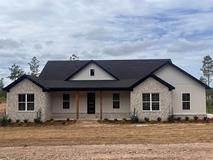 Beautiful New Construction home in the country yet close to town! Lots of space and plenty of room. This home is a must see! Open kitchen with large island, custom cabinets, rock fireplace, wood beams, large walk in pantry, laundry room connects to the primary closet, large primary suite with walk in closet & bath! Home also offers a small office or play area. This home has so many custom features! The backyard is beautiful and has lots of space with a deck overlooking it all.