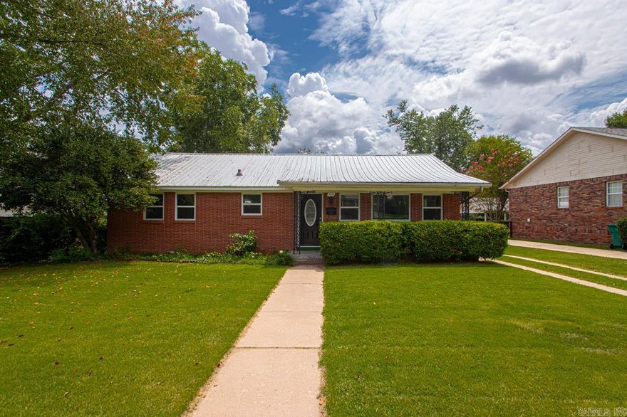 Take a look at this wonderful home located in this highly sought after area of downtown Benton! This 2 bedroom home has tons of space and a second living room that could easily be converted to a third bedroom. You will enjoy the convenience of all the great shopping and restaurants that downtown Benton has to offer located just a few minutes walk from your front door! This property also features a large garage, carport and a very private backyard that will make you forget that you are in the middle of town. Contact your local agent today to get more information and to schedule a private showing!