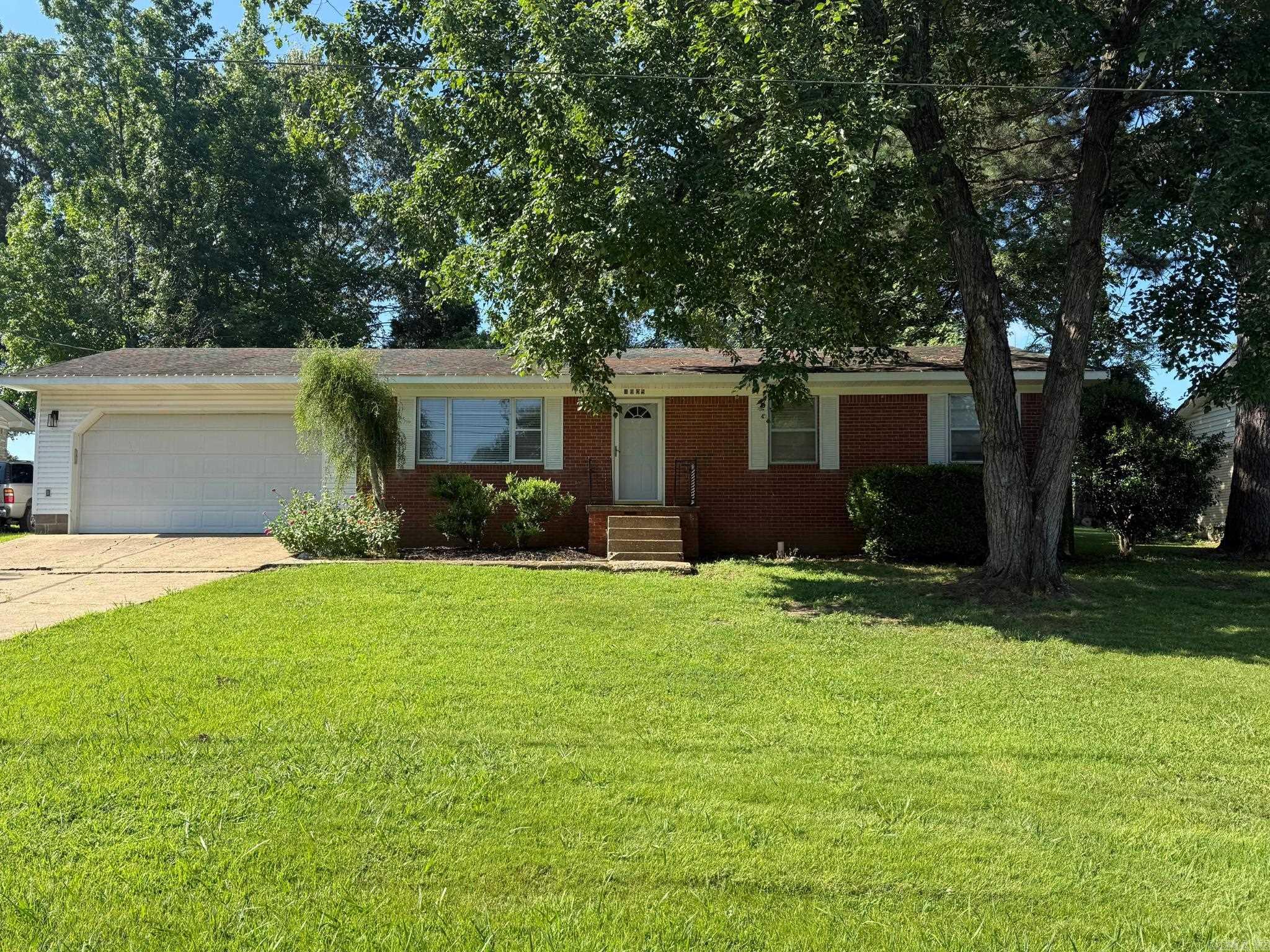 Affordable and updated, this charming 3 bedroom, 2 bath home is nestled on a quiet, tree-lined street and offers a fully fenced backyard with beautiful shade trees and mature landscaping. Love to cook? The kitchen features a double oven, large pantry, and a new dishwasher. Major updates include a roof and HVAC system both under 5 years old for added peace of mind. Plus, this home is ZERO money down eligible, making it an excellent opportunity for qualified buyers! Agents, please see remarks for updates list and info.