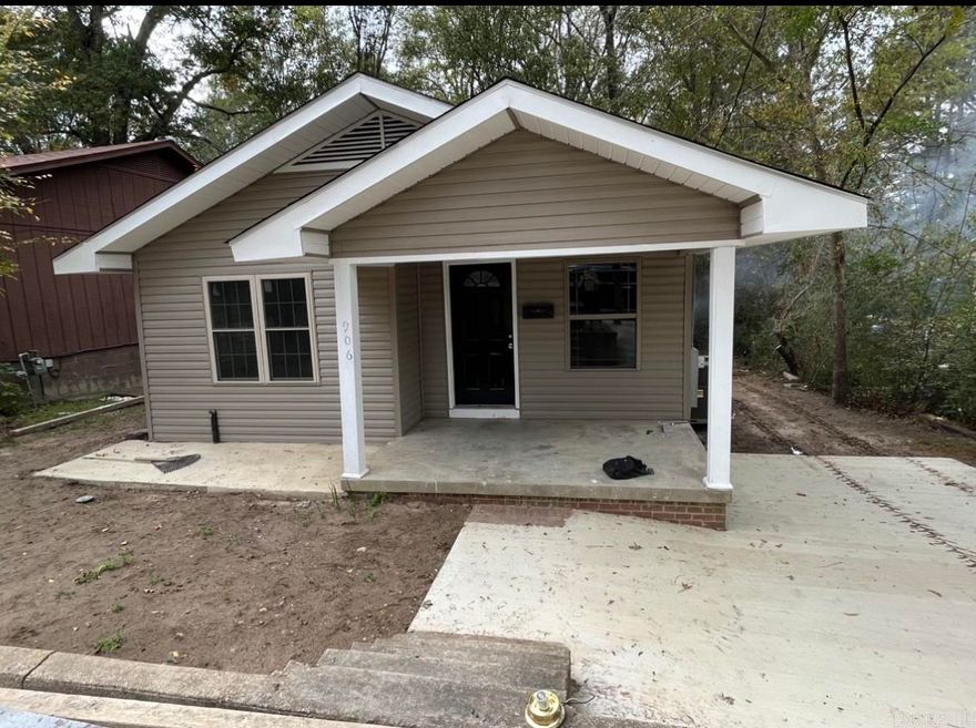 COMPLETELY REDONE inside and out. New Roof, vinyl siding, central heat and air, flooring, granite countertops in kitchen and both bathrooms, new windows, new kitchen and bath cabinets, new concrete driveway, Like having a new house at a great price and in town close to everything.