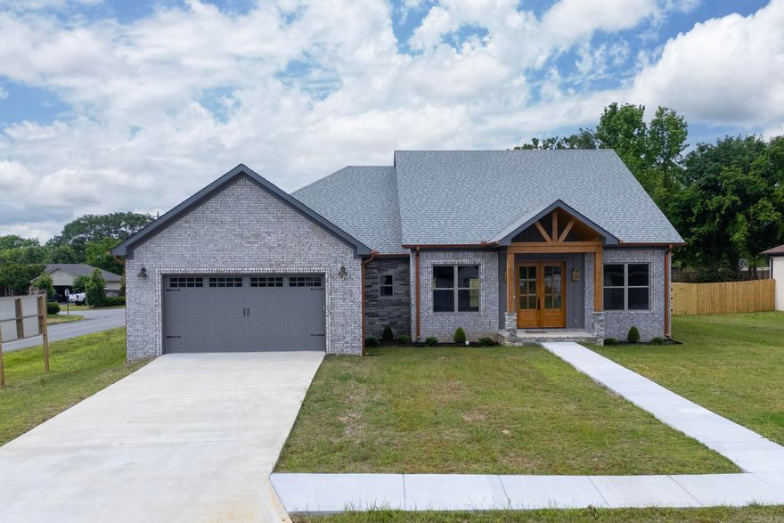 This new construction home is a standout with luxury details that rival any custom built property and is situated on a large .37 acre lot with a fenced backyard.  From the elegant Copper Penny gutters to the stunning leather granite countertops & stone backsplash, every feature exudes sophistication. Exquisite light fixtures and engineered hardwood floors create a seamless flow throughout the house. The kitchen is both beautiful and practical, with soft-close drawers and cabinets, under-counter lighting, a spacious center island, a fridge and ample storage. Added bonuses include a half bath, a built-in mud bench, walk-in pantry closet, and a laundry room with tons of cabinets and counterspace. The generous sized spare bedrooms offer comfort while the primary suite is the eptiome of luxury, complete with a super sized closet and a beautifully designed bathroom. You will also find many energy efficient features here including spray foamed insulated ductwork.  This home is built for both style and function!! Call to sschedule your viewing today!