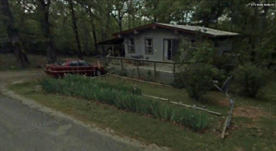 2 level Home on 2 Lots with lots of room. This home offers 2 bedrooms, possibly 3 and 1 full bath and 2-3/4 baths, kitchen, living room, central heat & air, small shop and storage area on the carport, nice sized front deck that wraps around one side. Newer metal roof and a walk-out basement with a bedroom, 3/4 bath and a large open space for a great room or for a family room; game room. The second lot is to the left side of the home and has been cleared and does have some gardening or flower beds.