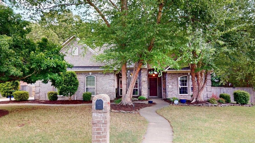 Welcome to this beautifully designed 3-bedroom, 2-bath home tucked away on a  cul-de-sac in Southwind. This home is thoughtfully laid out with a split floor plan & dedicated office space off the primary. Step inside to find abundant natural light pouring through the home, highlighting the rich hardwood floors and stunning architectural details. Elegant arched doorways add character throughout, while custom cabinetry and built-ins provide both style and practical storage. Separate dining room greets you as you walk in the home. From there you will find a huge eat in  kitchen with wall to wall cabinets, stainless steel appliances, breakfast bar, and walk in pantry. The spacious living area flow seamlessly, creating a warm and inviting atmosphere that overlooks a beautiful wooded and beautifully landscaped backyard. Spacious primary bedroom with large walk in closet, double vanity, walk in shower, and tub. Two guest bedrooms can be found separate from primary with a full bath on same hallway. Home also features a separate laundry room with sink. Relax outside with a extra large wood deck &  fully fenced yard. Two car side entry garage tops off this meticulously well maintained home.