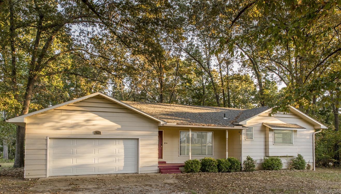 This 3 bedroom, 2.5 bathroom home sits on an oversized lot and features recent updates including a new deck, gutters and new shingles on roof (2024). Inside, you’ll find a cozy kitchen with dark wood cabinetry. The primary suite features a large picture window with bench storage, walk-in closet, and private ensuite bathroom. The spacious second bathroom includes garden tub. The third bedroom offers flexible use as an office, playroom, or den. One of the home’s standout features is the large basement/storage area, with tall ceilings that make it perfect for a workshop or exercise space.