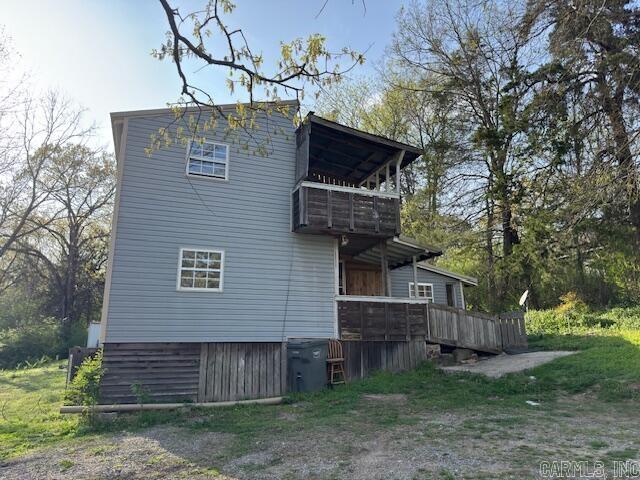 OWNER FINANCING This spacious 3/4 BR home features 1,324 square feet, along with many potential add-ons for more square footage. The upstairs loft could make a fun bedroom and leads out onto an elevated front porch, that is perfect for a morning view! Property Features plenty of storage space and outbuildings. $10,000 dp, 9% int. Agent Owned Currently No Heat/Air/Appliances-Negotiable with acceptable offer.