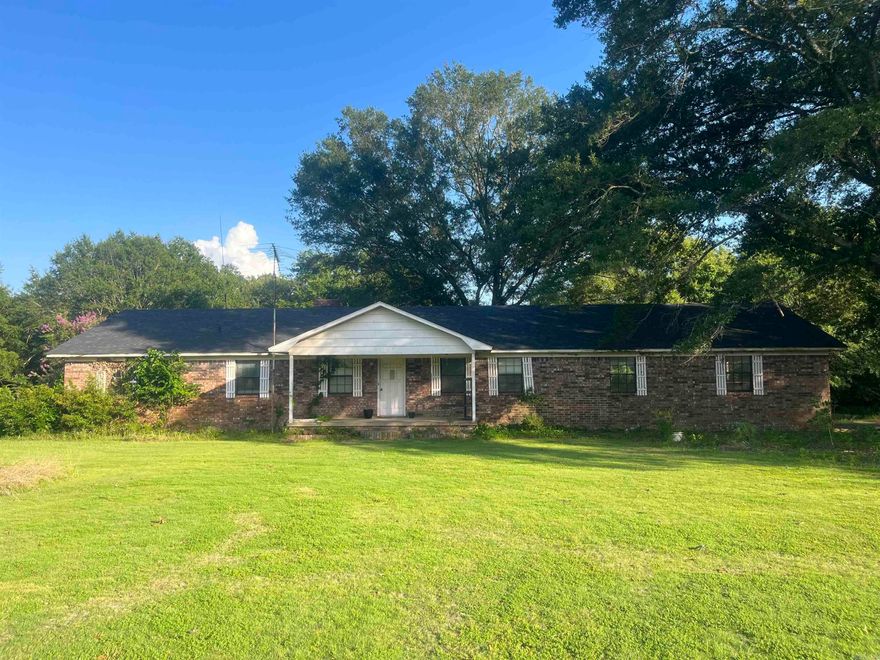 This 3-bedroom, 2 bath home sits on an expansive 9.11 acres (approx.). Inside you will discover approx. 1,601 square feet of functionality. The master is separate from the other bedrooms, and a beautiful fireplace sits amidst the living room and kitchen.  Enjoy your time outside fishing in the pond or working in the shop. Adding to the property's appeal is an existing mobile home that currently generates rental income. Don't miss out on this one!