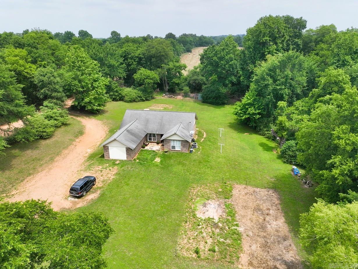 Please Note a Seller paid buy down option is available with this property!!Extremely hard to find this newer 4-bedroom 2 bath brick home that is priced to sell!! Country location is DeQueen School but is close to Horatio. Home was built by Robert Walker in 2009 a first generation of the Walker Brothers Construction! Open eat-in kitchen/dining area. Has separate utility room. Will qualify for all types of financing. Move in condition situated on 1 acre with a shared fishing pond and a creek that borders.