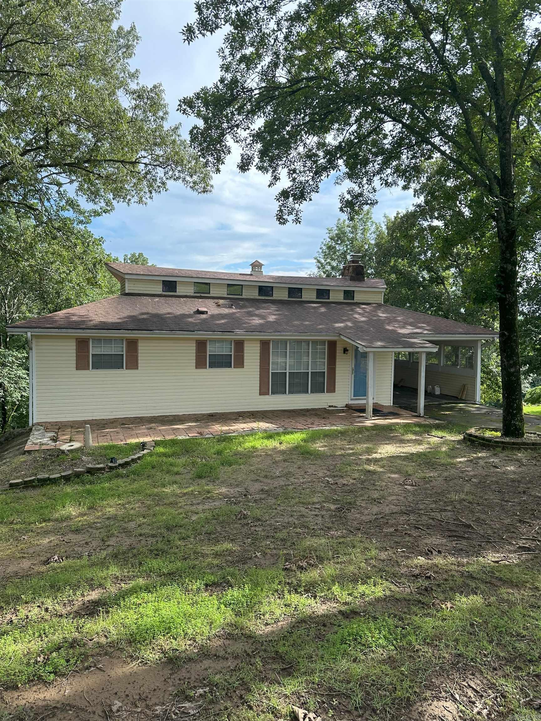 This 2 bdrm/2 bath cozy cottage on the shore of Greers Ferry Lake is a must see! New dishwasher and new microwave this year. Large Bonus room downstairs with it's own bathroom. Could be perfect for welcoming extra company or it can be used as a TV or game room. There is a loft for extra storage too. The back deck shows off a stunning view of the lake. The back yard has a firepit and an easy walking path down to the lake. This home is clean and very well maintained and move in ready. Don't miss out on this one!