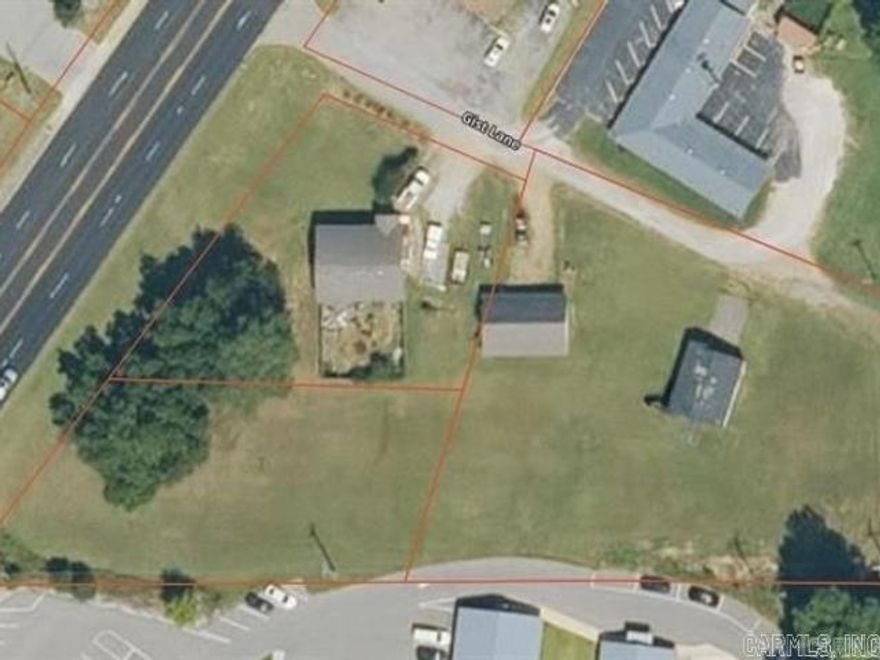 This property is currently zoned residential, with strong potential for commercial rezoning due to its prime location along Highway 49 North and being surrounded by commercial properties on three sides. The seller understands and agrees to be responsible for rezoning the property.  The seller currently occupies the home, so all showings must be scheduled in advance to view both the house and the detached garage. The home is solid and may be a candidate for relocation rather than demolition, offering additional flexibility for future development.  The seller will provide a complete legal description prior to closing. Current legal descriptions are available online and accessible to all agents. The property includes only two structures: the main house and the detached garage. A former outbuilding at the rear of the property has already been removed.  To better understand the layout and potential of the land, buyers are encouraged to view the property on ONX Hunt or Google Earth. The possibilities for this site are truly endless.  If you feel the price does not reflect the opportunity, take a look and share your vision for the property. The seller is open to all reasonable offers.