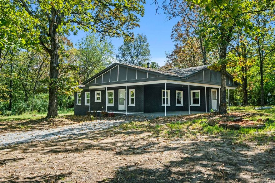 Welcome to your fully renovated beautiful home sitting on 1 acre just right outside of town. This home is constructed with all concrete walls so it's built to last! NEW roof, NEW flooring, NEW stainless appliances, New double pane energy efficient windows throughout, NEW paint inside and out, NEW outdoor fire pit perfect for entertaining! Beautiful park right across the street with a walking trail and nice area for kids to play. 3 bedrooms and 2 baths, large kitchen and laundry room. Schedule your personal tour today!