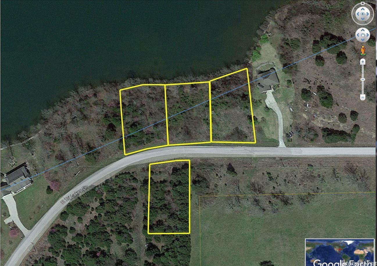 3 Lakefront Lots, recently cleared and side by side by side on Beautiful Crown Lake. 1.35 acres of level ground right on the south shore of Crown Lake in Horseshoe Bend. Not to mention a .45 acres Lakeview parcel/lot just across the road from these three. Which is also cleared. The lakefront lots have recently been dozed down and most of the scrub trees have been piled up. One of the lots has an updated perc certificate and all of them have been surveyed. The Lakeview Lot is still wooded and does have a recent perc-certificate as well. Come see the view and pick out your building spot for your wonderful vacation home or permanent home on the Lake. The Lake view lot is nearly a 1/2 acre in size. It would make a great homestead as well. Total property with all 4 lots is approximately 1.8 acres. Horseshoe Bend boasts 4 Lakes including beautiful Crown Lake along with the Turkey Mountain 18-hole Golf Course and Cedar Glades Par 3 course. then there's the Cedar Glade resort, the Crown Point resort and let's not forget the Box Hound Marina, Resort and RV park. So much to do so much to see. Schedule your visit and enjoy your get away. The price is firm and non-negotiable at $149,000.00