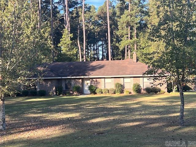 THROUGH NO FAULT OF THE HOME, THIS ONE IS BACK ON THE MARKET WITH MOTIVATED SELLERS! SELLERS OFFERING A $20,000 REMODEL CREDIT! Call for an appointment to see this well-maintained 4 bed, 2.5 bath, 2300sf home situated on 3 beautiful acres in the desirable Quail Run Subdivision. The property has 5 shops wired for 120 and 240 volt electricity and a storage building as well. Plenty of room for a garden spot in back. Primary bedroom has its own private bathroom with shower. A cozy woodburning stove located in the large living room for cold winter nights. Electric HVAC, age unknown. Shingle roof replaced approximately 20 years ago. Enjoy relaxing on the wonderful wooden deck watching deer and other wildlife, or in the enclosed sunroom. You may want to join the neighborhood pool for the summer. Refrigerator, washer, dryer & freezer all convey. Don't let this one get away!