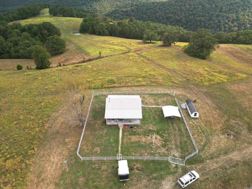 Welcome to 622 Daisy Lane in Yellville, Arkansas—an exceptional 80-acre farm offering breathtaking views of Marion County and the Ozark Mountains. This beautifully remodeled 4-bedroom, 2-bath home with fully finished basement blends modern comfort with country charm. The property includes a second home that needs work, perfect for guest quarters, rental potential, or a creative project. Enjoy a peaceful pond, a classic barn, and a chicken coop—ideal for hobby farming or a self-sufficient lifestyle. With rolling pastures, mature trees, and open skies, the land is perfect for livestock, gardening, or simply soaking in nature. Located just minutes from Bull Shoals Lake, you’ll have easy access to fishing, boating, and outdoor recreation. Whether you're seeking a private retreat, a working farm, or a multi-family homestead, this property offers endless possibilities in a stunning setting. Don’t miss your chance to own a slice of Arkansas paradise.