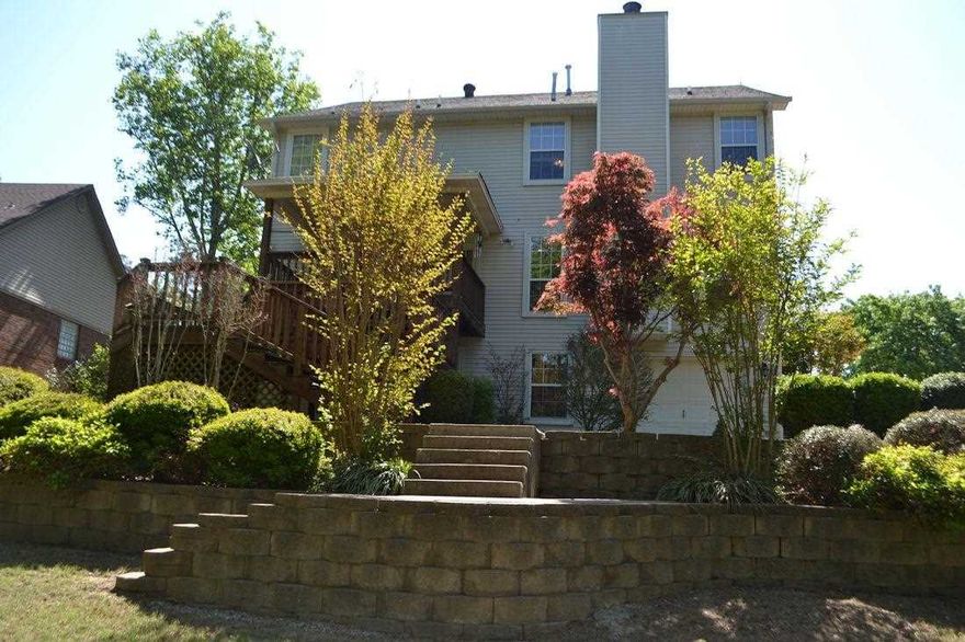 Priced to SELL!! Beautiful home that has been updated! Lots of space!  4 BR 2 1/2 bath w/LG bonus room.  Large kitchen and great room with wood burning fireplace. Private backyard w/extra landscaping. Gorgeous views off the double decks! Finished basementw/built-in. Updates include new HVAC, newer roof, extra insulation, gutters, top of the line carpet, plantation shutters and blinds, stainless appliances, new lighting fixtures, new paint.  Home is move in ready! Playhouse conveys!