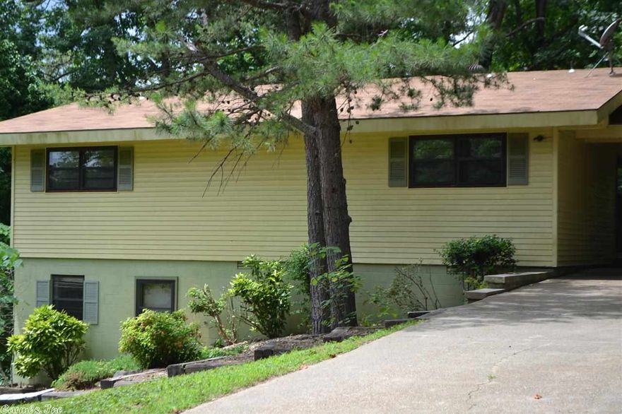 Price reduced $12,000.00!  Seller says sell, sell, sell!!!    This is what you've been waiting for!  Great home for the square footage!  2 bedrooms/2 baths on the main level and a third bedroom on the bottom level which could be a game room or a second living area.  Clean and ready for you to move into.  Convenient to area amenities and the main gate entrance.