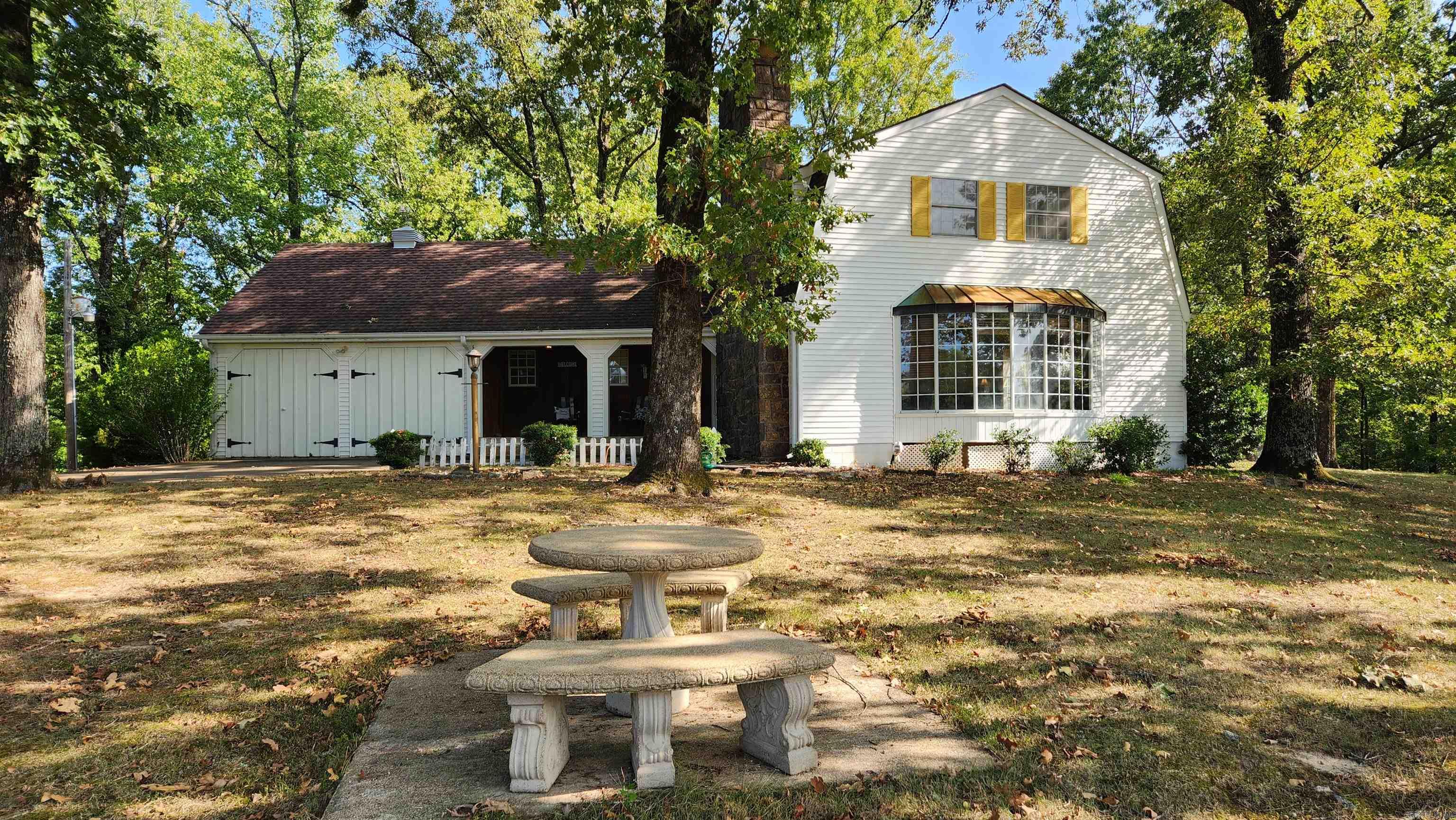 One owner home. New roof as of April 2025. This 2120 sq ft home, built in 1975, sits just enough off Highway 270 East. Features 3 bedroom, 3 bath. Large primary bedroom/bath (upstairs). Deck, clean yard, wood burning fireplace in the living room, tile floors in the kitchen/dining area and sweet mountain views. Bonus room is perfect for a hobby of any sort. Also, has a stocked pond and a wet weather creek. 10.99 acres with a couple of meadows. and a covered porch. Beautiful rock work. 24x32 storage building, 14x24 RV storage. Current survey and appraisal. Only minutes away to Lake Ouachita (4 miles to Twin Creek Rd) and only 30 miles to Hot Springs AR. Call today for a personal showing.