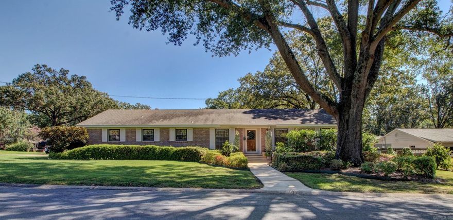 Located at the corner of Briarwood and Sun Valley is this stunning well maintained 1633 SF, 2 Bedrooms 3rd possible, 2 Full Baths, 1 Level Brick house. Stroll up the very wide inviting walkway to the front Entrance and take in all the Azalea bushes that are carefully manicured. House sits on a Corner Lot. Roof is Newer, HVAC 2016, Water Heater 2015. 2 Car Garage. Spacious updated kitchen with quartzite countertops, updated appliances, pantry, Refrigerator and Washer/Dryer Convey. Laundry next to kitchen. Original Oak Hardwood floors and tile flooring. Living Room, Family Den, Dining Room. Bonus Security System, Extra Storage Room In Garage. Relax in your Backyard Oasis under a gorgeous covered patio surrounding by Rose beds and raised garden beds. Master Gardner maintained the extra landscaping for 19 years.