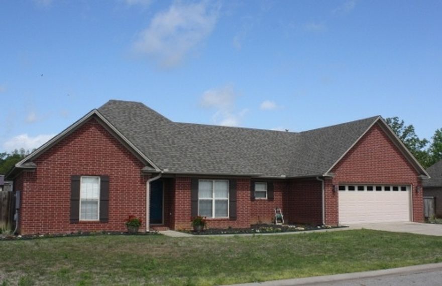 3 Bed-2 Bath w/ open living - kitchen & split bedroom floorplan. NO CARPETS-Hardwood floors thru-out (tile in laundry & baths) plus a U/V air purifier in duct system for those w/ allergy issues. Living room has vaulted ceiling & gas fireplace. Separate formal dining or office w/ tray ceiling. Lots of stained cabinetry w/ corner “lazy-susan” & trash can pull-out. Stainless appliances. Master has twin vanities w/ jetted tub & separate shower. ALL bedrooms have walk-in closets. Covered deck, large fenced yard.