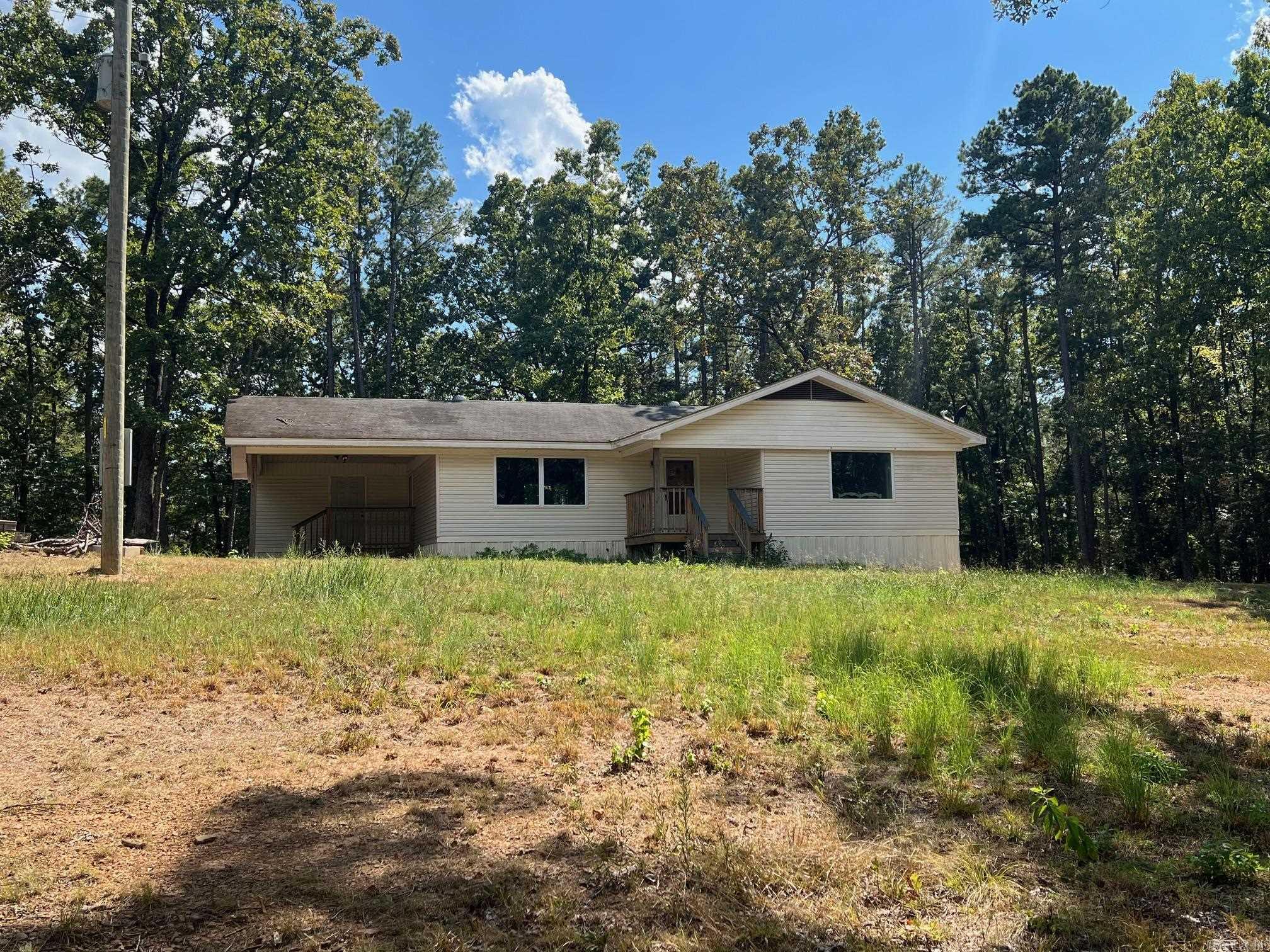 Nice Little County House for sale. Three bedrooms one bath, hardwood floors, new windows, new heat and air, new water heater. Sits at the back of 4 private acres. Gated entrance and good driveway