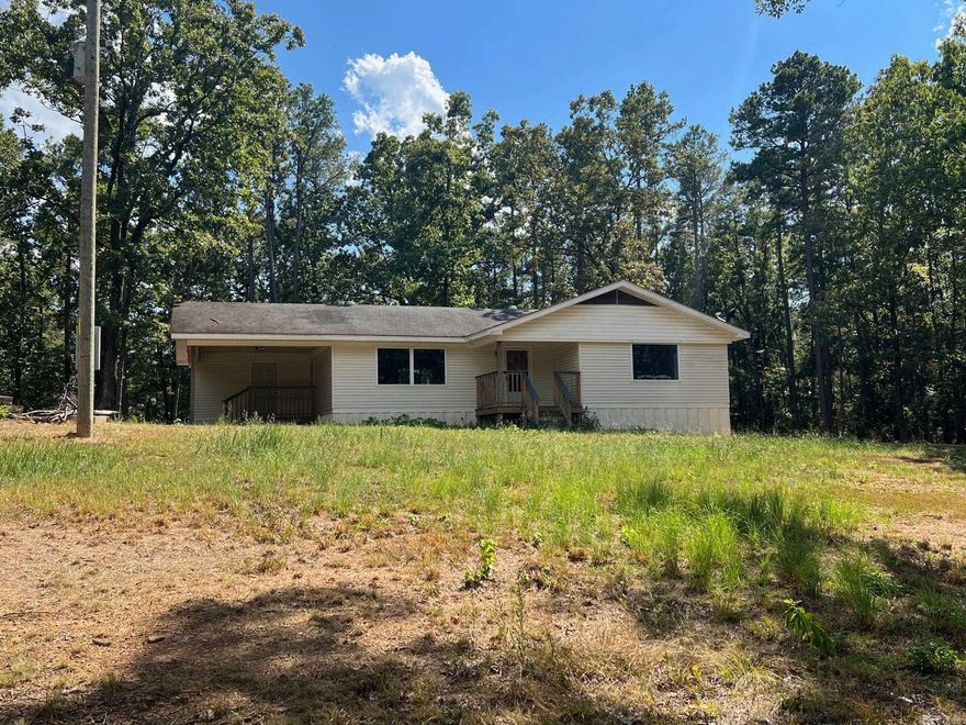 Nice Little County House for sale.  Three bedrooms one bath, hardwood floors, new windows, new heat and air, new water heater. Sits at the back of 4 private acres.  Gated entrance and good driveway