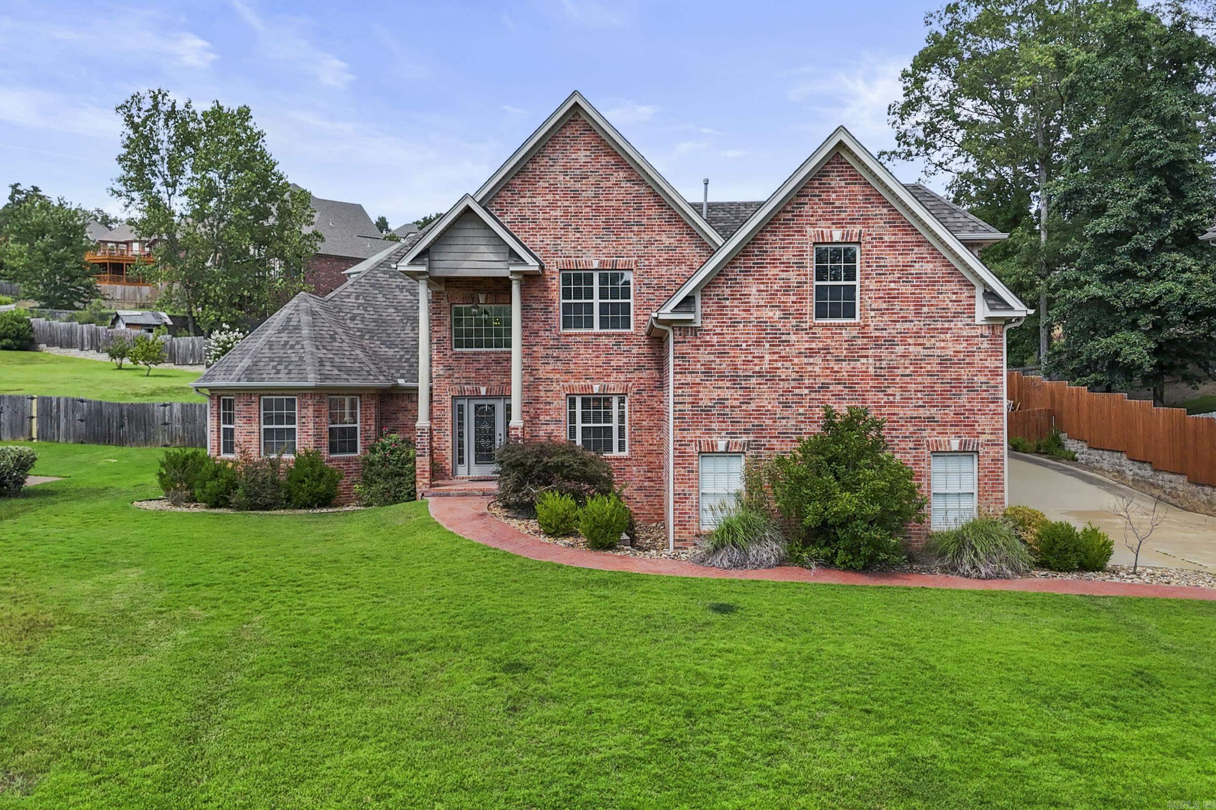 Welcome to your personal paradise in the heart of Maumelle! This stunning 5-bedroom, 3.5-bathroom home offers the perfect balance of comfort, space, and style—ideal for both entertaining and everyday living. Step inside to find an open, airy layout with beautiful natural light, tall ceilings, and modern finishes throughout. The spacious kitchen boasts granite countertops, ample cabinetry, and a breakfast bar that opens to the living area—perfect for family gatherings or entertaining guests. The primary suite is a true retreat, complete with a luxurious ensuite bath, soaking tub, separate shower, and walk-in closet. Upstairs features generously sized bedrooms, a bonus/media room, and flexible space that could serve as a home office or gym with a little love! But the real showstopper? The backyard oasis—complete with a gorgeous saltwater pool, covered patio, and privacy fencing for your own private escape. Whether you’re hosting summer pool parties or enjoying a peaceful evening under the stars, this home offers it all. Additional highlights include a 3-car garage, ample storage, and a location just minutes from schools, parks, and Maumelle’s best amenities.
