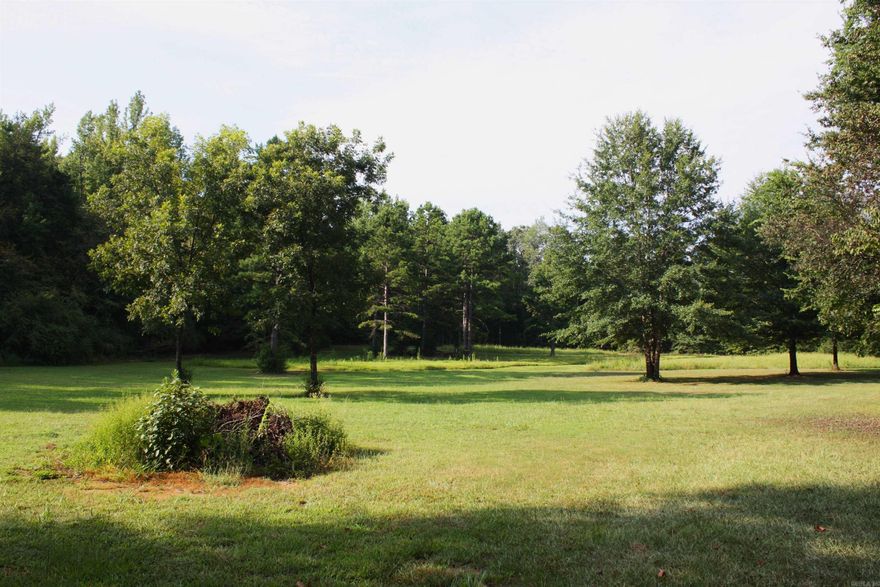 Nestled in the expansive national forest ground South of Lake Ouachita, lies the opportunity you have been looking for. If you are looking for a home base for public land hunting, hiking, boating or other outdoor adventures, this is it. It is a perfect spot near the lake for family activities and to get away from the hustle and bustle. for the hobby farmers, the homesteaders, and anyone who wants a great property to enjoy, build your dream home, and hunt; I mean it when I say this is it. The pictures do it little justice. For wildlife, the pasture, gasline, topography, oak trees, creek, timber ground, and national forest ground in the area point to one thing: game. Game on for avid hunters as there is a good population of deer and turkey spotted on the game camera. For the homesteaders or hobby farmers, the pasture sets up great for gardening, the nearby creek offers tons of opportunity as well. To the dream home builders, this place is gorgeous and you'd be proud to pull in the drive to your new dream home. Folks, she is a beaut, and I am ecstatic to find a new owner. Call the land specialist for your private viewing today.