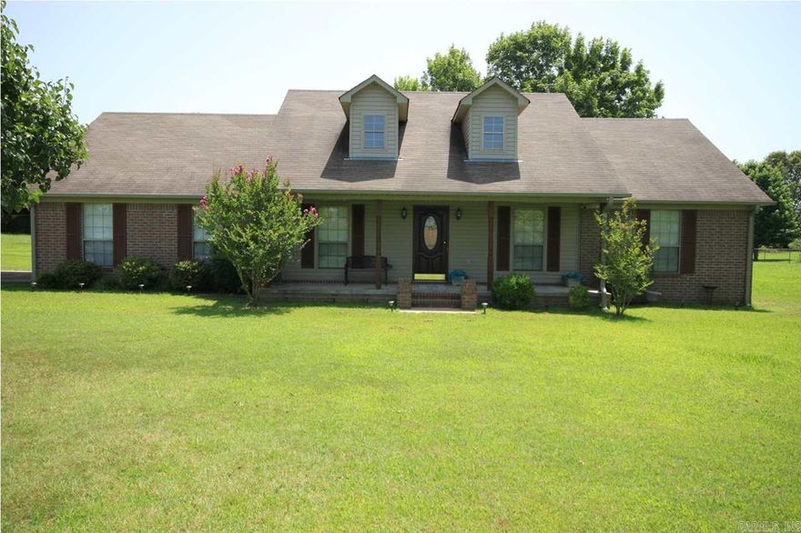 Beautiful brick home situated on 1.38 acres of level ground. Long covered front porch. Large great room with an office off to the side. Beautiful kitchen with oak cabinets. Dining area overlooking the deck and backyard. Split bedroom plan. Master suite has His/Her closets and double vanities. Large game room. Deck with hot tub. Huge backyard with a storage shed.