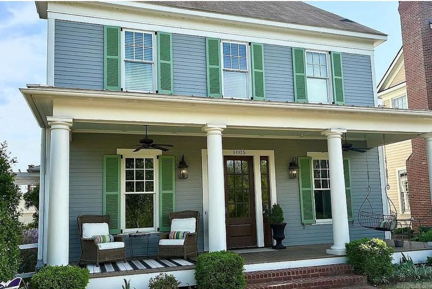 Beautiful home on a large corner lot in the coveted Village at Hendrix subdivision.