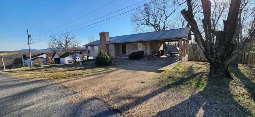 Have you been looking for Cotter real estate with a view? This charming 2,105 sq. ft. Cotter home offers breathtaking year round bluff views of the White River! The main floor features 1,505 sq. ft. of living space and a sunroom perfect for relaxing and enjoying the scenery. Basement with a separate entrance provides an excellent opportunity for 3rd bedroom, rental income or a private mother-in-law suite. The home boasts great storage throughout, a cozy wood-burning fireplace, and numerous updates, including a new HVAC system (2023), new furnace (2023), new deck (2023), and a new roof (2024). Conveniently located just minutes from the White River, Cotter’s downtown entertainment district, Cotter schools, and Big Spring Park. All appliances, including the refrigerator, washer, and dryer, convey.