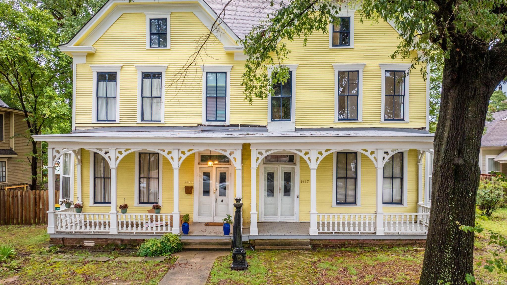 Step into Little Rock’s past while shaping its future at the Wierman-Gemmill Double House — a one-of-a-kind Italianate landmark built in 1884. Comprised of two mirror-image residences sharing a common wall, it’s the only 19th-century double house known to exist in the city. Local lore says it was built for two brothers who wanted to live side by side, but not under the same roof — a detail that makes this home as storied as it is rare. The left side (1415) is fully income-producing, divided into two leased apartments — a 2-bedroom/1-bath downstairs and a 2-bedroom/2-bath upstairs. The right side (1417) awaits completion, with the flexibility to finish as a single-family residence, mirror the left side with two additional units, or bring your own vision to life. Architectural plans are available, and historic tax credits remain untapped — creating a unique opportunity to combine steady income, restoration potential, and financial advantages. All of this in the coveted MacArthur Park Historic District, placing you steps from SoMa dining, MacArthur Park, and the Arkansas Museum of Fine Arts. Here, history, opportunity, and lifestyle converge in one remarkable address.