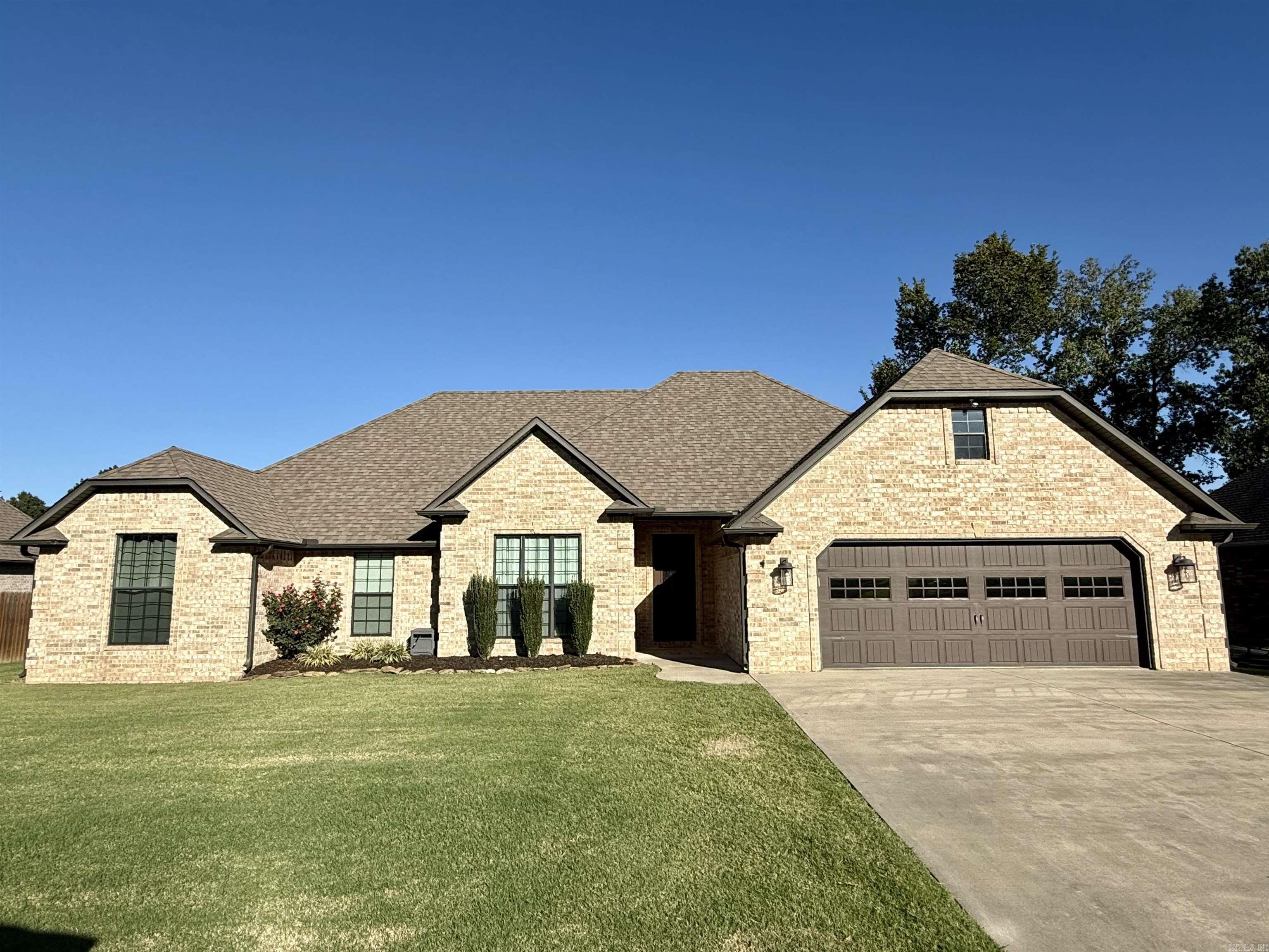 This stunning 4-bedroom, 2-bath home, built in 2016, offers 2,371 sq ft of comfortable living space on a .27-acre lot. The open and split floor plan is perfect for modern living, featuring tall ceilings throughout. The spacious kitchen, with granite countertops and stainless steel appliances, flows into the main living area, creating an ideal space for entertaining. A huge dining room with a charming brick column adds character, while the laundry room is conveniently accessible from both the hallway and master closet. The master suite with a double tray ceiling includes a luxurious bath with granite countertops. Outside, enjoy a fenced backyard for privacy and relaxation. Samsung refrigerator stays! Donāt miss the opportunity to own this beautiful, move-in ready home!