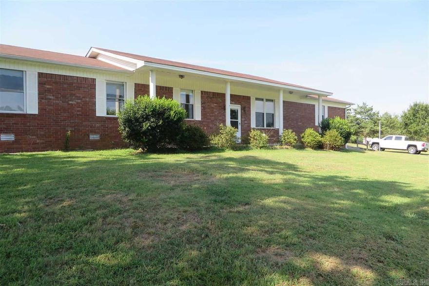 Peaceful hillside with a stream. What more could you ask for? Immaculate 3-2 with office, sewing or craft room. 2 car garage with additional 1 car separate work shop. Sunken living room opens into dining area. Kitchen has been redone with beautiful cabinets! Covered deck out back to relax on. Room to roam on 1.56 acres.