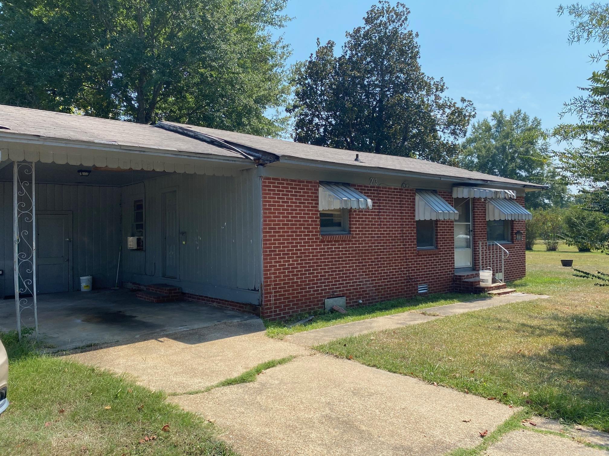 Two-bedroom 1 bath brick home located in the center of town with convenient access to the schools. New water heater installed in 2024. This home with a little bit of work and updates could be a forever home or a great investment property.