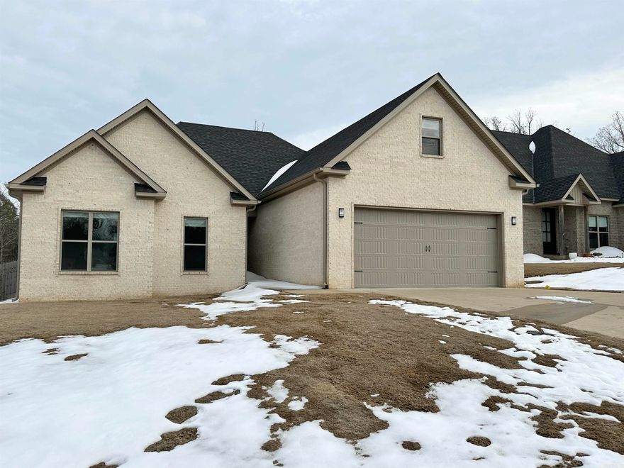 Stunning 4-Bedroom Home in Golf & Pool Community! Welcome to your dream home! This beautifully maintained residence offers four spacious bedrooms and three full baths across 2,440 square feet of living space. Enjoy soaring vaulted ceilings and a cozy fireplace in the main living area, perfect for relaxing or entertaining guests. Step out onto the screened porch or the extra-large patioideal for outdoor dining and gatherings. The backyard is designed for low maintenance, so you can spend more time enjoying the amenities of your golf and pool community. The kitchen is truly a chef's dreambetter than new, with modern finishes and thoughtful upgrades, all in a home built in 2021.