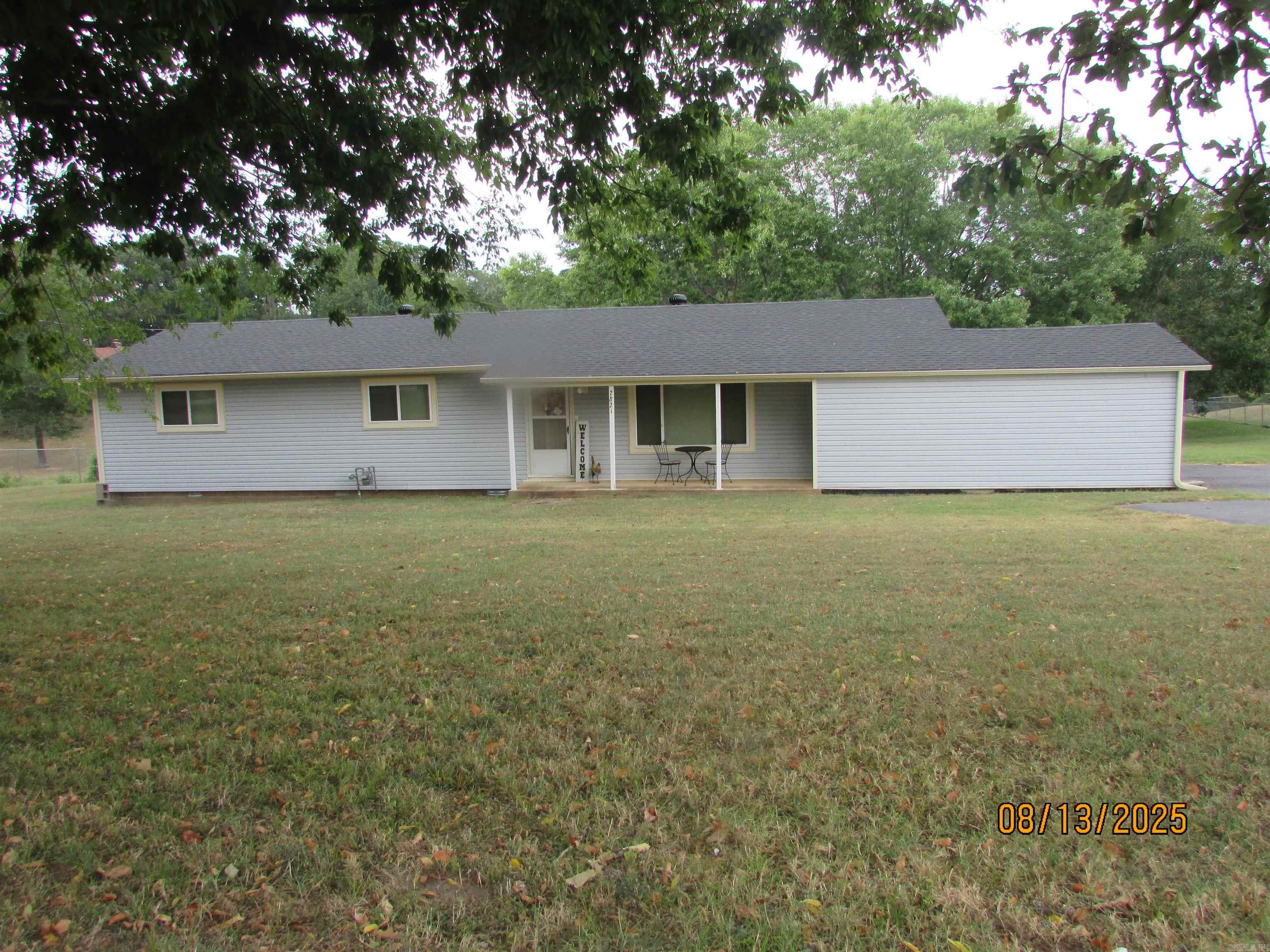 Country home feel but still conveniently located near shopping, restaurants and just a couple of min to the freeway. New roof 2024. HVAC is around 6 yrs old. Windows were replaced in 2009. All rooms are good size. Large lot features 2 storage buildings. There are a few handicap features. Large peaceful yard to just relax and enjoy BBQ's or see an occasional deer. Put your own personal touches on this home and make it yours!