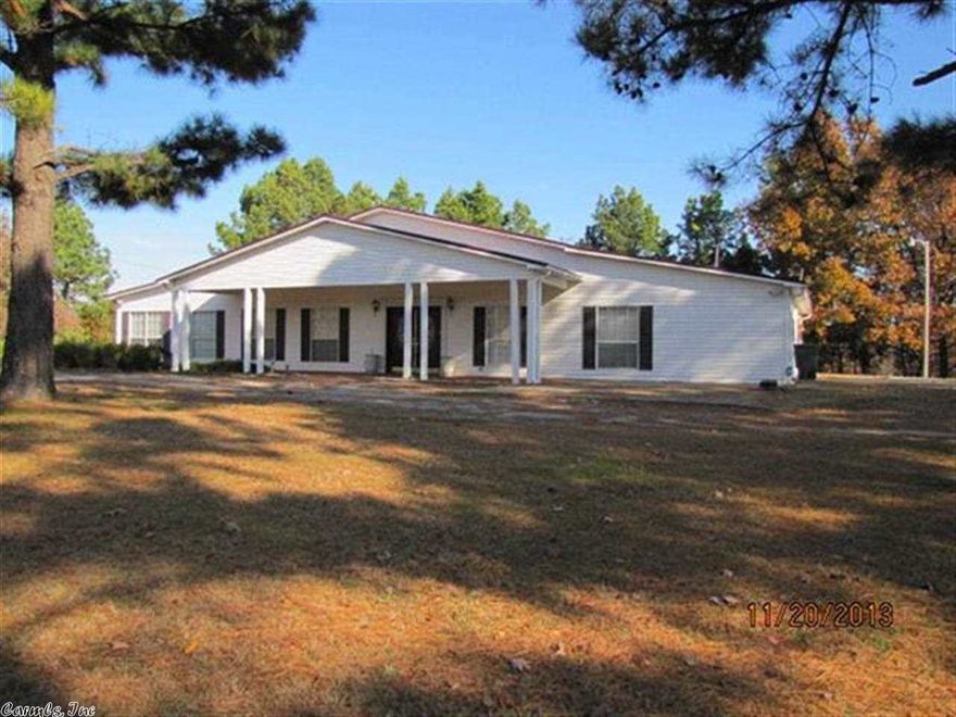 Room to spare on this large country residence on a beautiful 11.87 acre parcel on Crowley's Ridge. 4000 square feet with extra large rooms throughout, including 2 living areas, a large gourmet kitchen, 4 bedrooms and 3 full baths. Laundry room is spacious with extra cabinetry. Fireplace in the great room with exposed beam ceiling. Tall kitchen counters mean less bending over! Wall ovens and center island in kitchen. Covered patio with a private view of the gorgeous backyard.