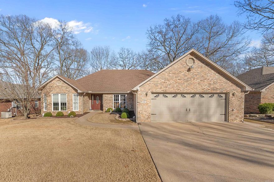 Welcome home on Indian Bay Drive. Be the second owner to this custom built home and enjoy the warm and spacious layout. No steps! All one level, even walk-in showers!! Brazilian Cherry hardwood fills the living areas, water resistant bamboo in the kitchen, and tile in the bathrooms! Split floor plan with 3 bedrooms, come in from the garage to the laundry room and into the kitchen. Garage is extra large, park your boat inside! Outback you will enjoy entertaining on the wood deck and having extra storage in the shed. Bathrooms have been updated. You’ll love the heated mirrors. Master walk-in closet has a chute to the laundry room! Central air runs through an allergy filter, a huge benefit in Arkansas. Square footage is from building plans, please measure. Please see remarks.