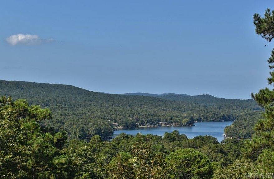 Magnificent View of Lake Cortez and Mountain ranges protected by the acre lot below, price for two lots. Ideal building home site for either a one or two story home with a walk-out  basement.  Builder pointed out that a well appointed home can have a gradual driveway and additional privacy.  Must see in person.