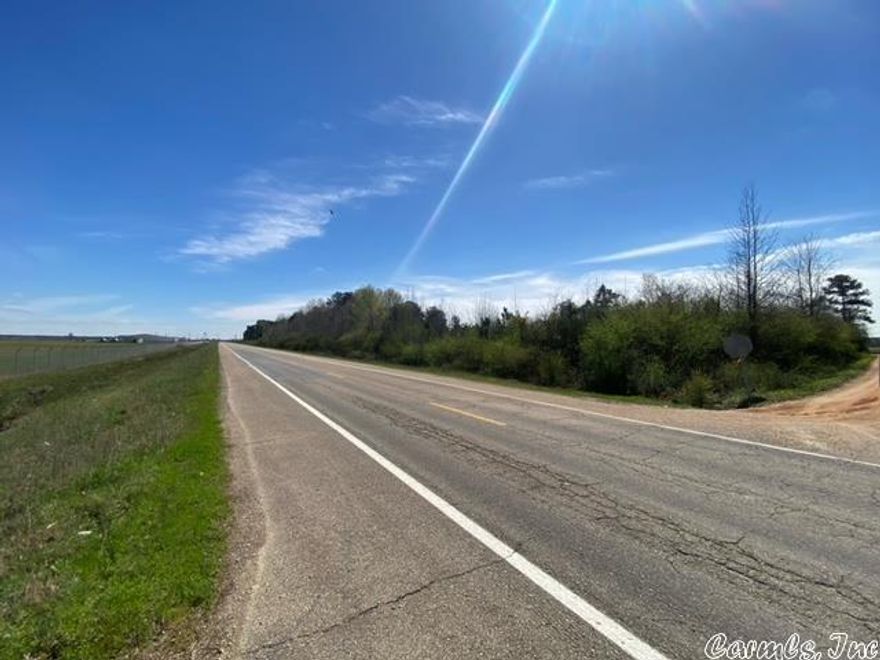 If you are looking for a location to build a cabin or possibly a shop to headquarter from, this is the place for you. This property offers approximately 2,450 feet of state highway 52 frontage directly across from the Crossett Municipal Airport making access effortless. It is located less than 1 mile from the Prairie Country Club, just minutes from the city of Hamburg, and is lying in the middle of some of South Arkansas' finest deer hunting and farm ground. So if you are looking for a place to work, hunt, or play from, this is it. Owner Financing may be available.