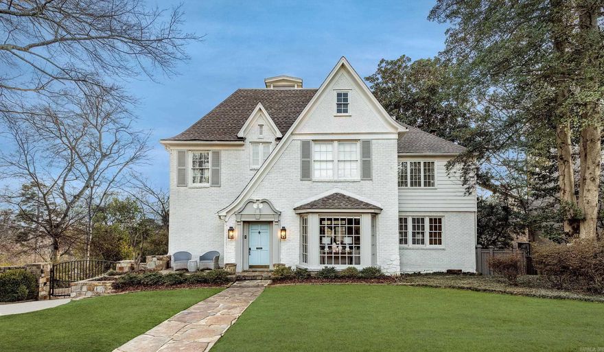 Gorgeous Heights home w/ every amenity on spectacular double lot overlooking greenspace. Handsome strt appeal w/ beautiful classic design and updated interior. Large Living Rm opens to formal Dining Rm. Sunny eat-in Kit with ss appliances and walls of windows. Upper terrace for al fresco dining. Inviting Family Rm w/wet bar adjacent powder rm. Up: Spa inspired Master Suite w/ luxurious ba & private sitting rm/office w/fp. 2 Bedrms w/ hardwd flrs share Ba. Lower level: Play Rm/4th Bdr, 5th bedrm, Bath & Den!