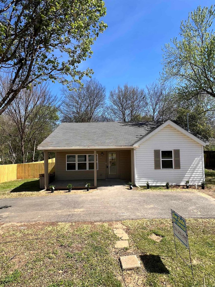 Adorable & fully remodeled, move in ready home! New plumbing, electric, heat & air, appliances, cabinets, sheetrock, flooring, tile shower, large fenced yard and a storage building!! Stack washer-dryer & fridge stay with the home!