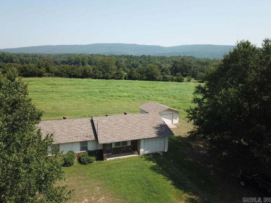 Welcome to this extraordinary property! Situated on nearly 0.54 acres of pristine pasture, this stunning property offers a truly remarkable living experience. Immerse yourself in the beauty of nature as you enjoy the breathtaking Mountain views that will leave you in awe. Step inside and be captivated by the thoughtful and meticulous remodeling that has transformed this residence into a home where you can relax and unwind. You'll appreciate the recent upgrades that have been made for your comfort and convenience. In 2019 a new HVAC system was installed, as well as new roofs on the house and the shop. Additionally, a new hot water heater was installed in 2020. New kitchen appliances and flooring were installed in 2024. Don't miss out on the opportunity to own this one-of-a-kind property!!